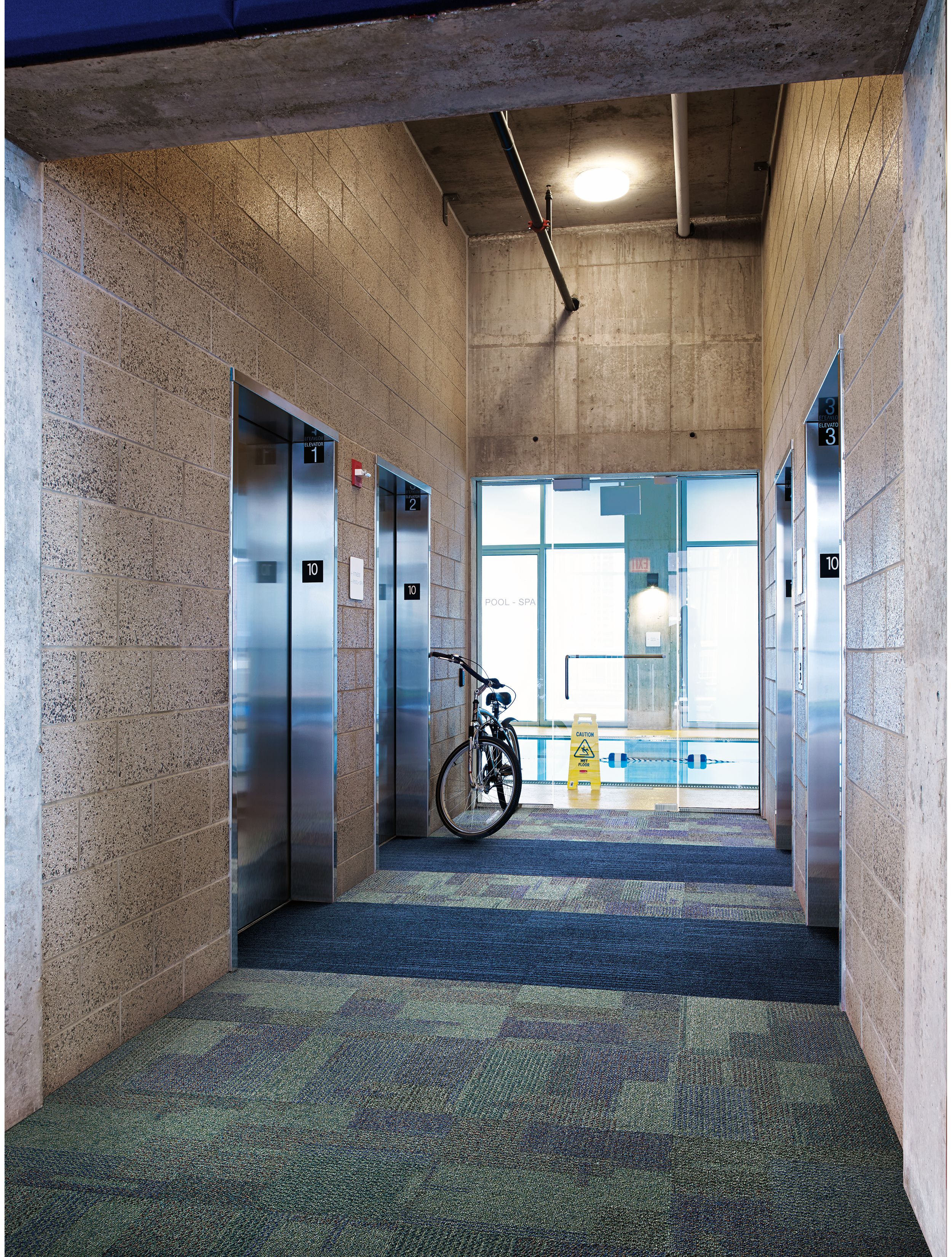 Interface The Standard and On Line carpet tile in hallway with bike image number 6